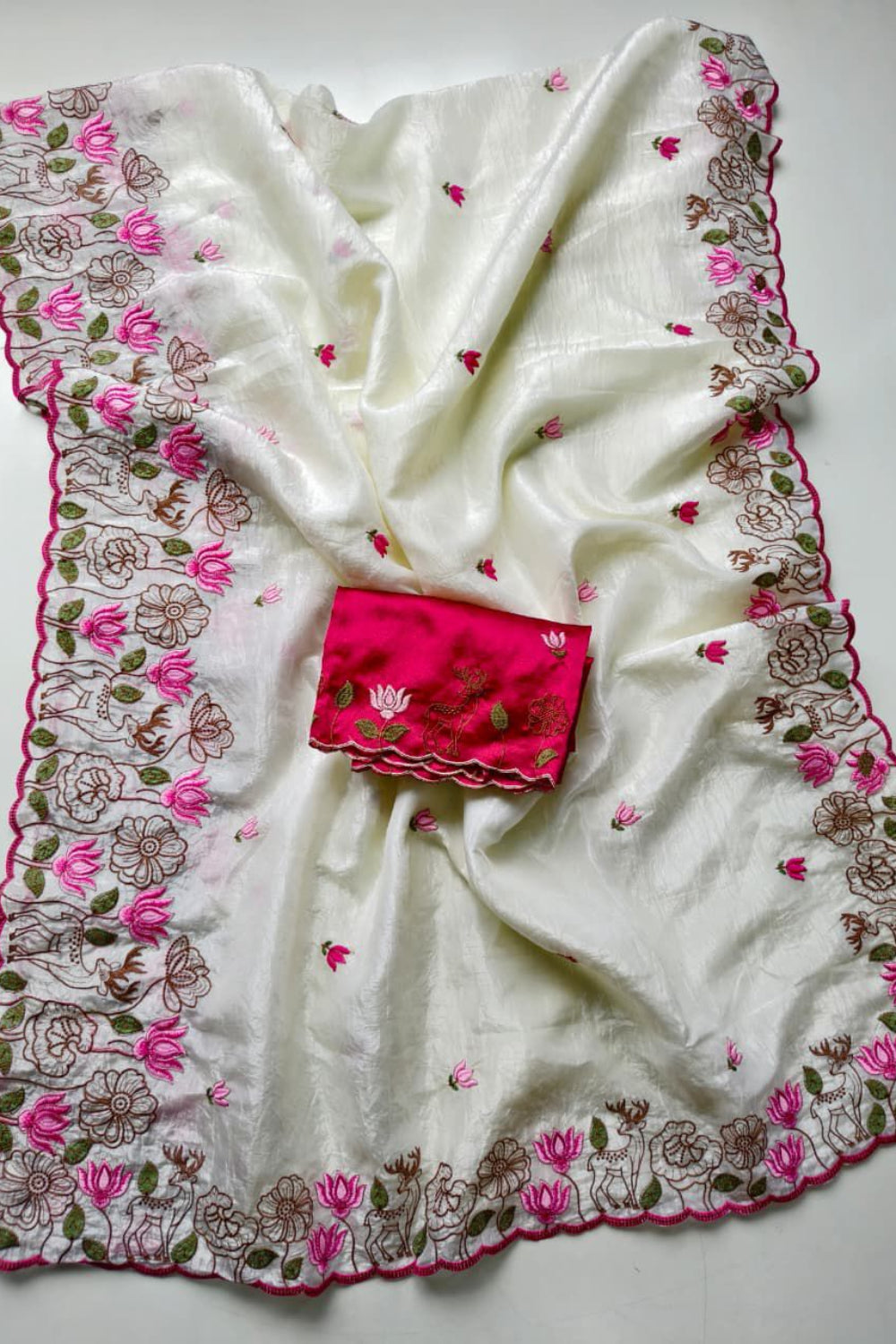 White with beautiful embroidery work