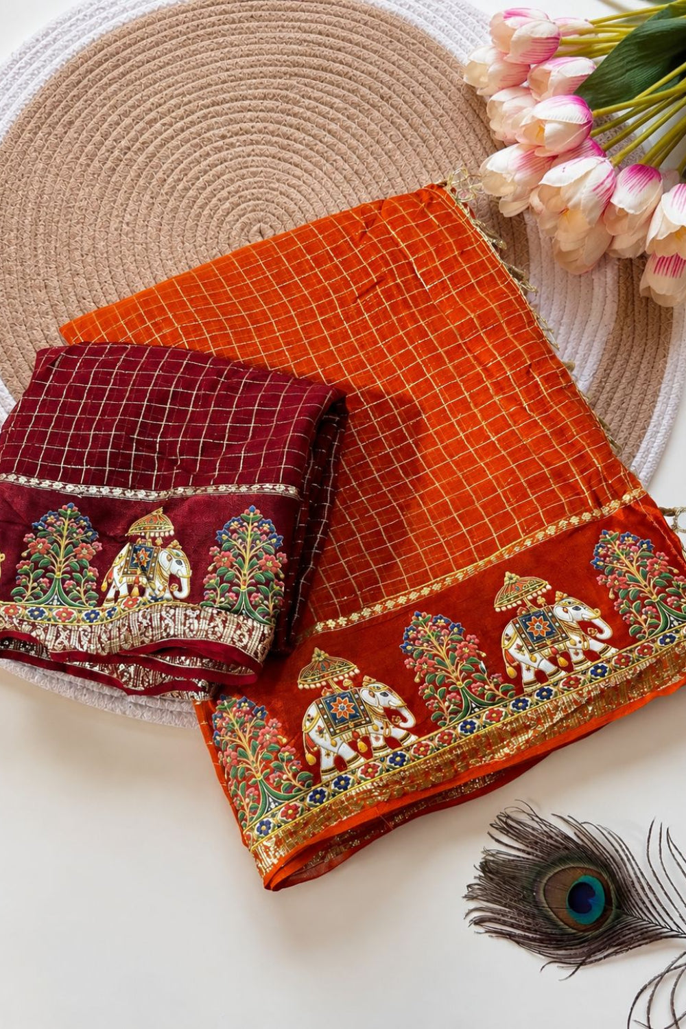 Orange saree with satin border
