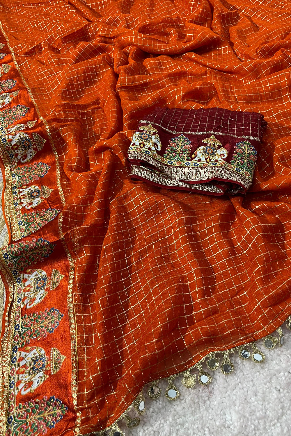 Orange saree with satin border