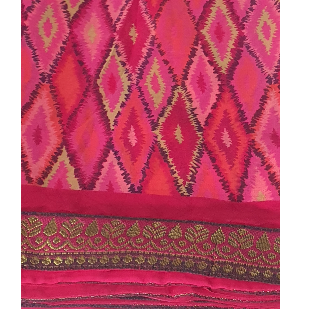 Soft Saree Printed Saree on soft material with brocade border. This saree is maintenance free. Daily wear easy to carry Brown saree sari