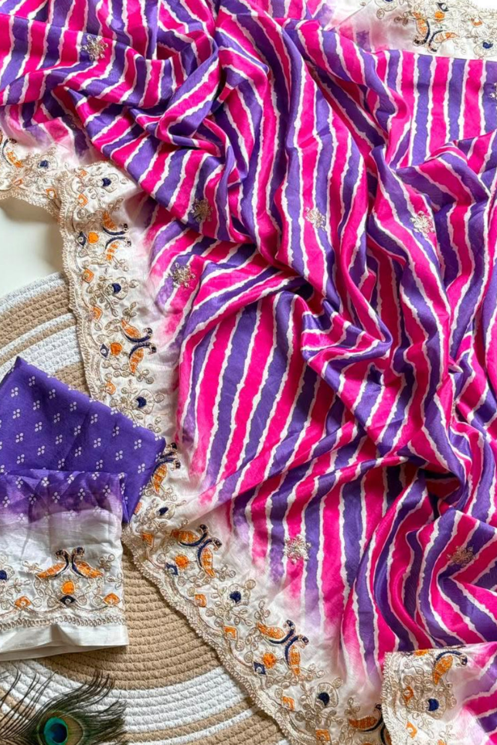 Pink Violet Lehriya print embroidary work festive wear saree