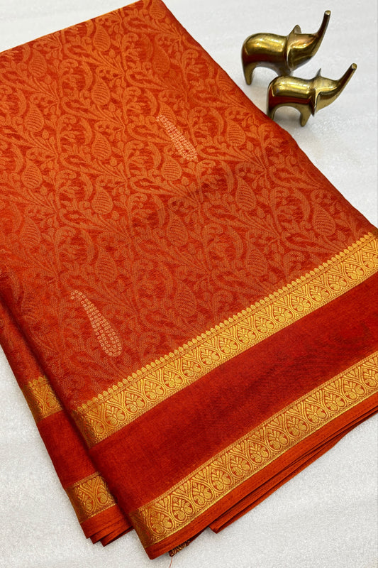 Vibrant orange saree with jacquard weaving