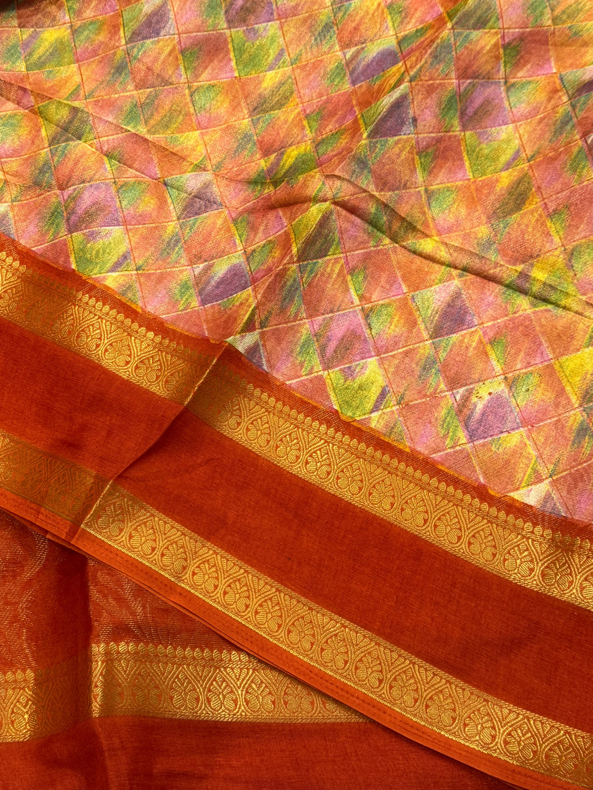 Vibrant orange saree with jacquard weaving