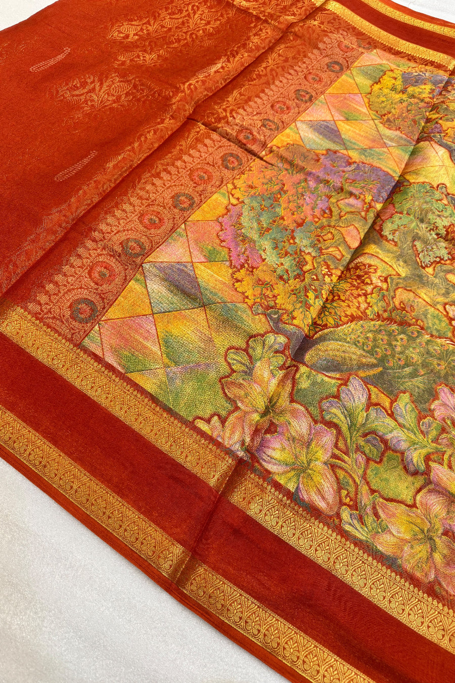 Vibrant orange saree with jacquard weaving