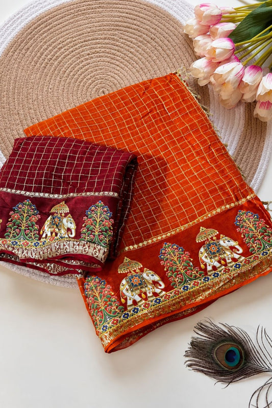 Orange saree with satin border