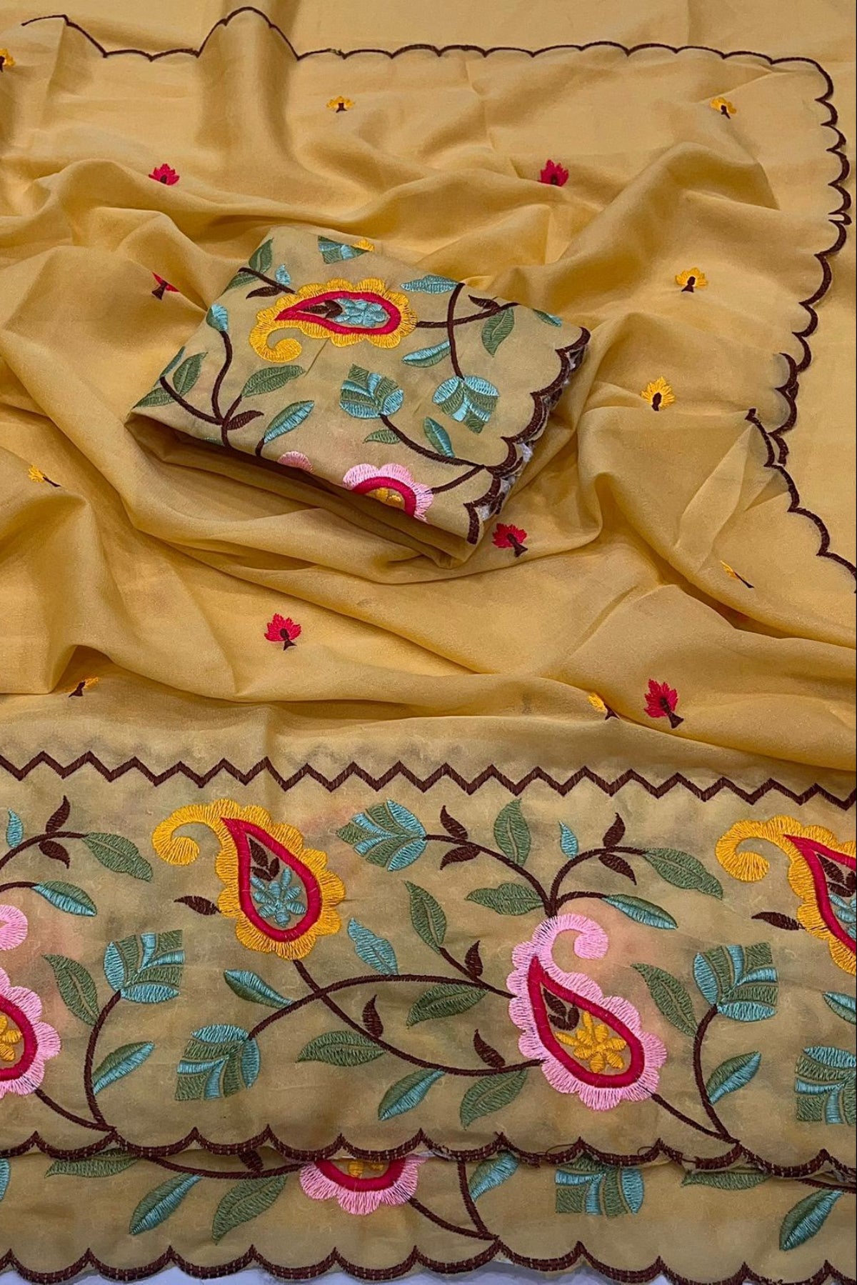Yellow embroidery work saree