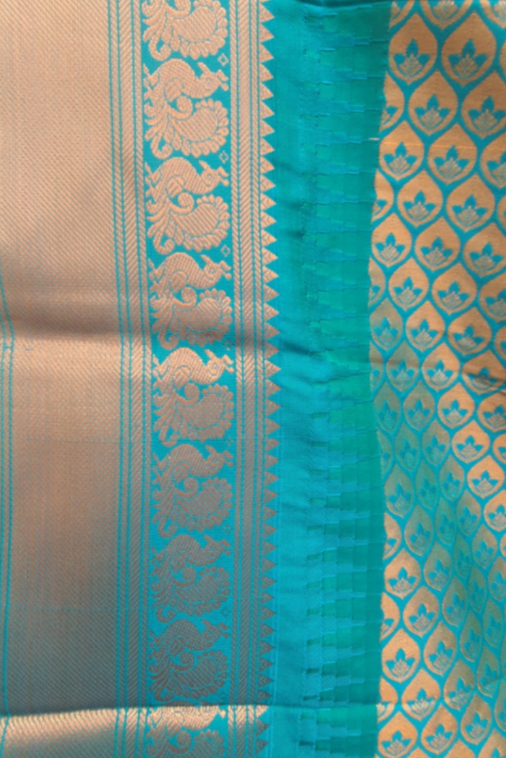 Pure Kanjiwaram saree Orange color saree with green and firozi blue color border pallu along with zari work. Wedding occasion, party function, house warming, griha prawesh. 